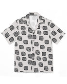 White shirt with black geometric pattern on a white background