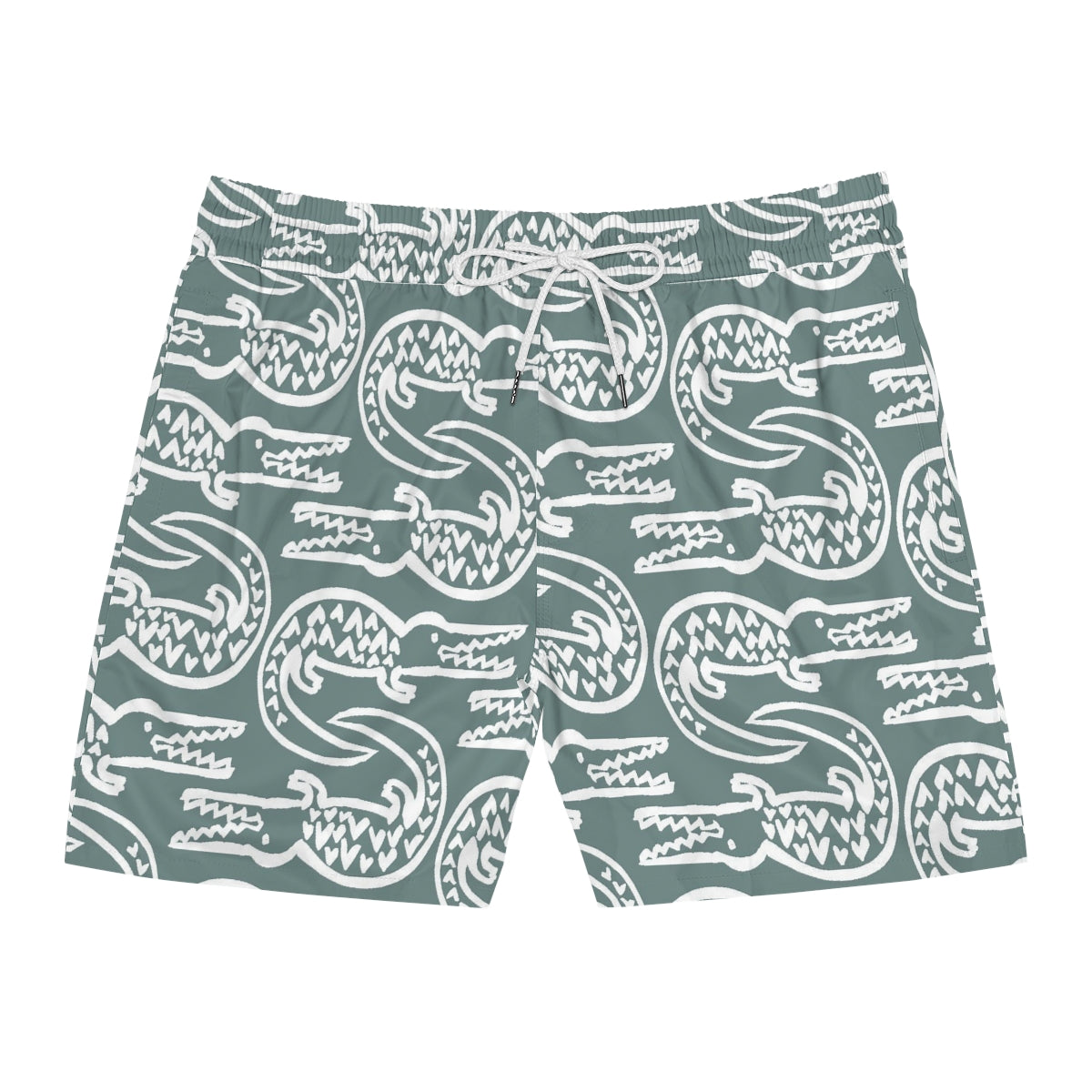 Green swim shorts with white crocodile pattern on a white background