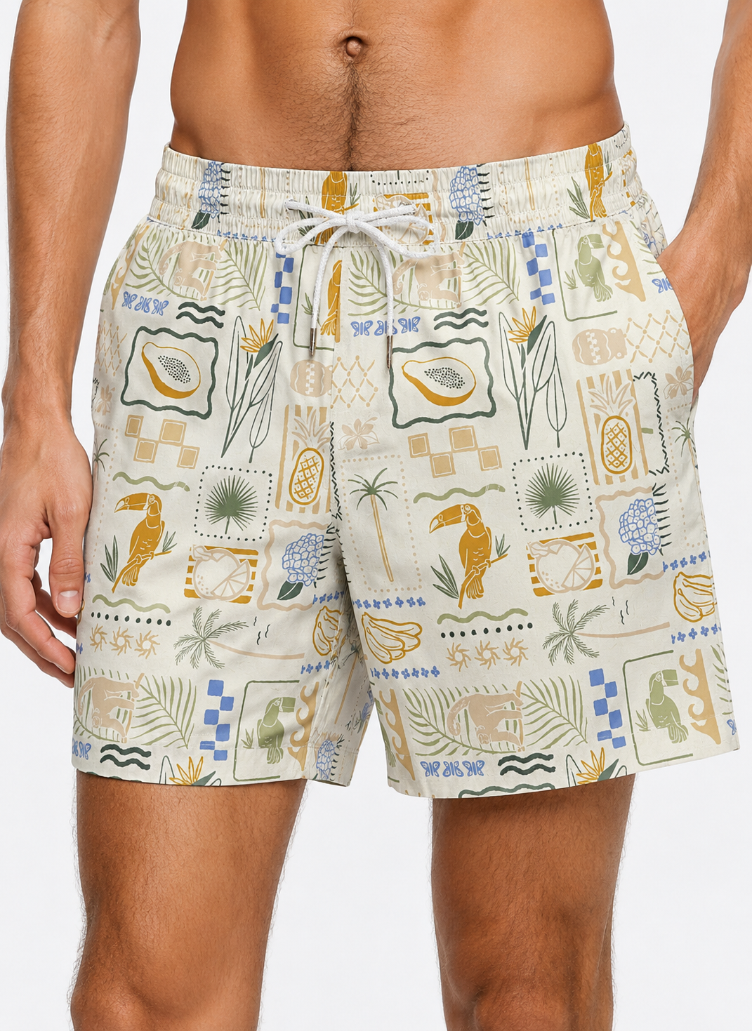 Tropical patterned shorts worn by a person on a white background